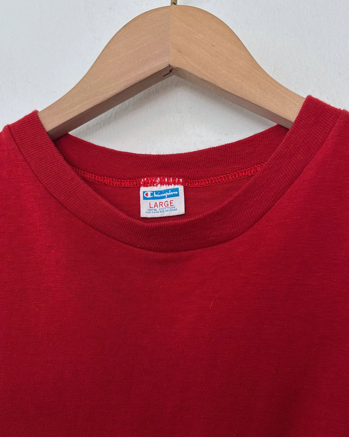 Champion Tee